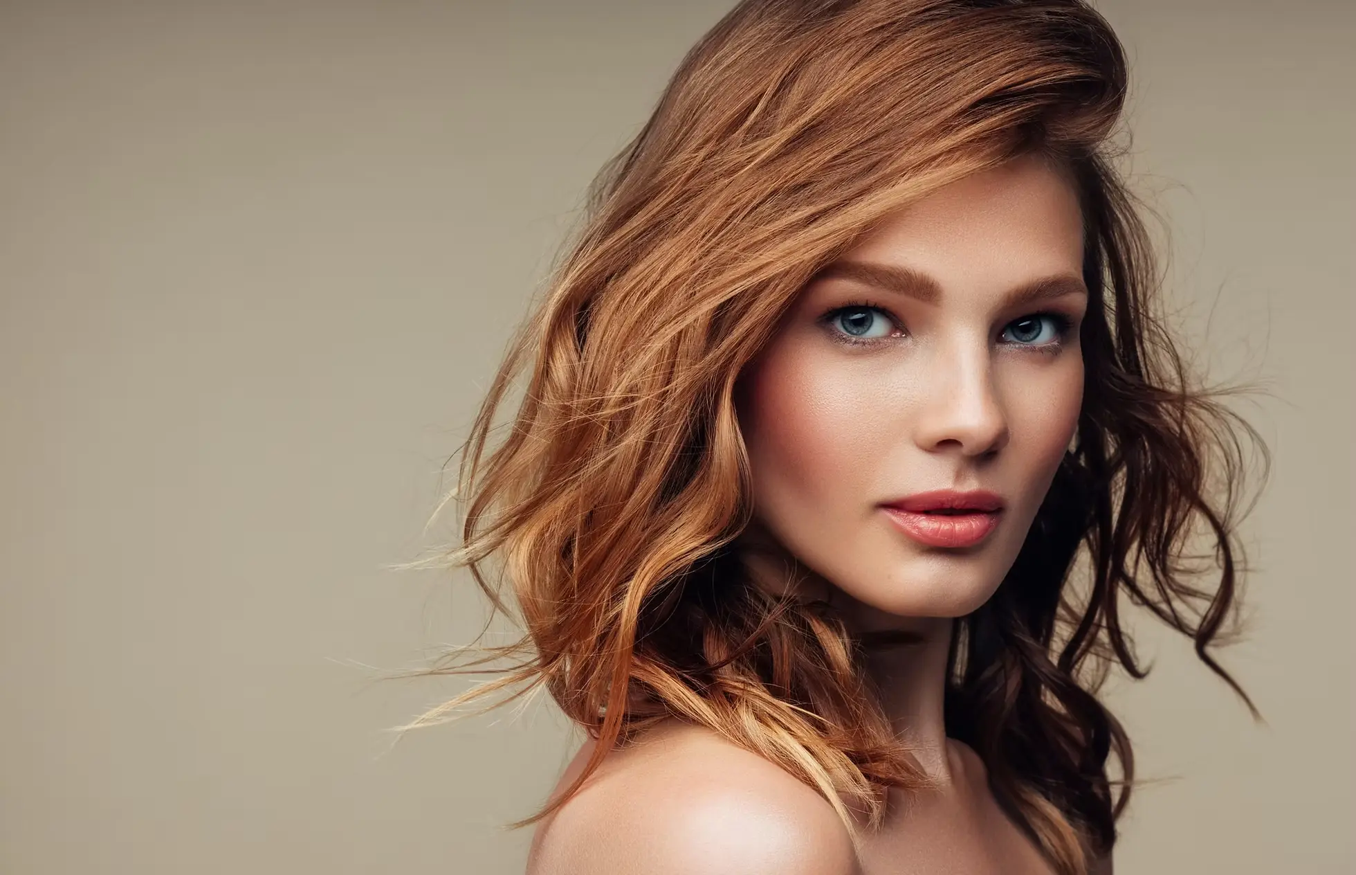 Professional hair salon interior in Rancho Santa Margarita with modern styling chairs and mirrors